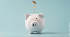 Pièces tombant dans une tirelire