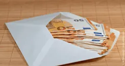 Wie funktioniert ein Sparbrief? Das Bild zeigt einen Brief mit Erspartem
